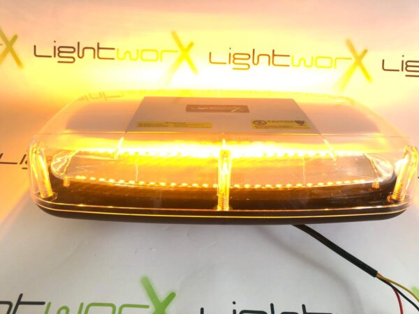 LED Minibar 12/24V, ECE R65, R10, IP56, 15 x Flash Patterns, Pole Mount, Clear Lens, Amber Light